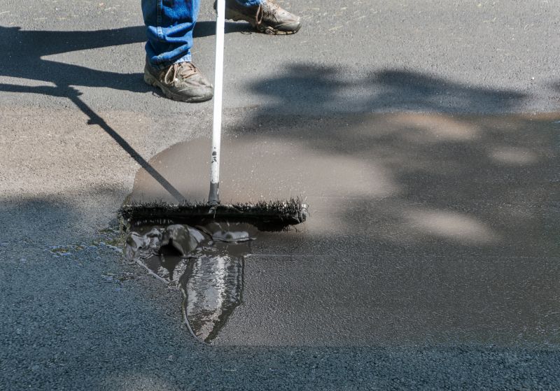 Applying Asphalt Paint